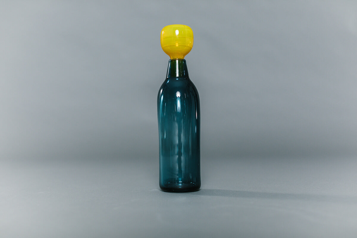 blue glass decanter with yellow glass stopper handblown by Vicky Higginson for AUTHOR