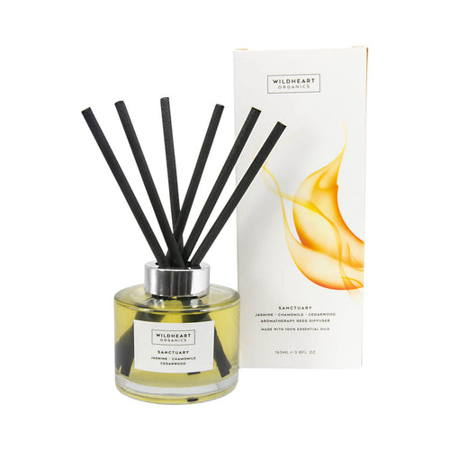 Wildheart Organics Sanctuary Diffuser set. Image shows a 165ml bottle with 6 diffuser reeds, and the outer packaging.