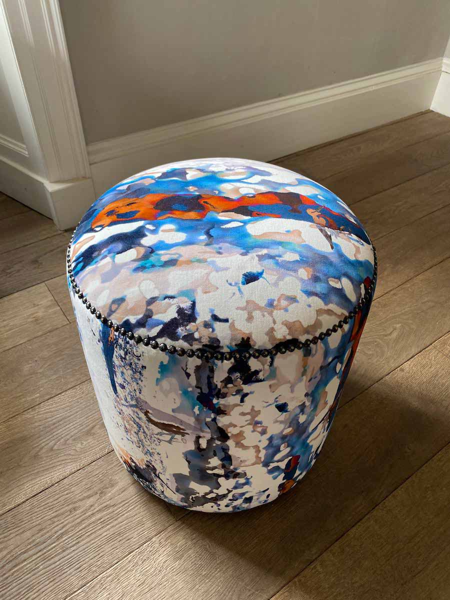 Modern stool in blue and burnt orange velvet fabric by Mairi Helena for AUTHOR Interiors collection of luxury furniture brands in the UK